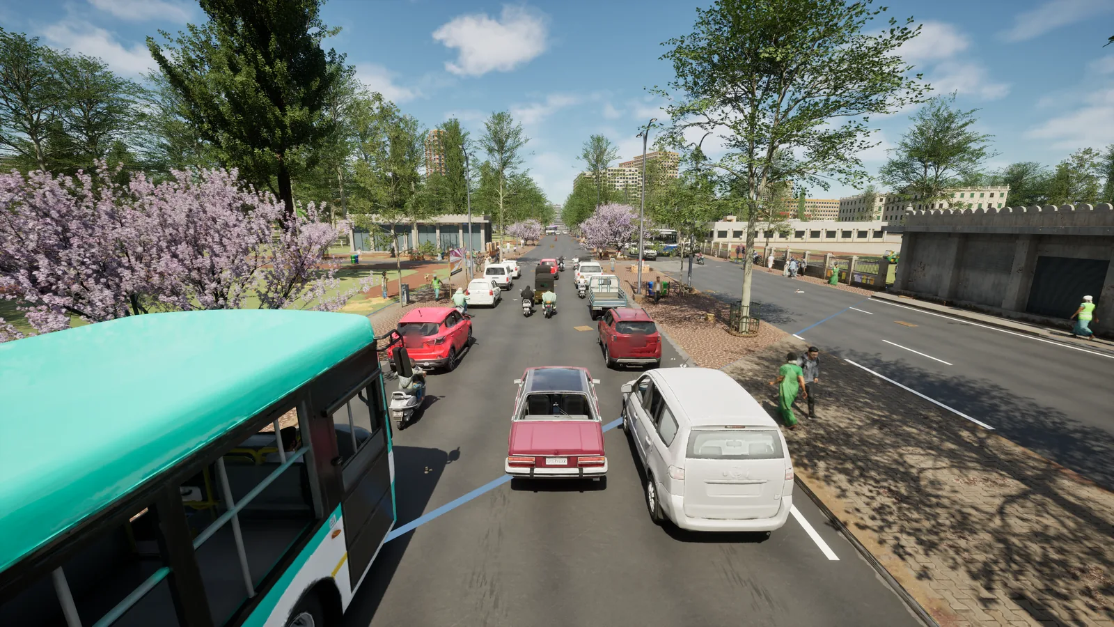 Traffic queue under jacaranda trees on Ambedkar Veedhi